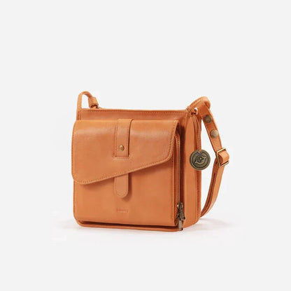 Liana™ – La bolsa que protege tu mundo y refleja tu estilo.